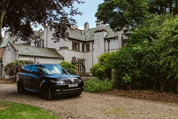 CPW Chauffeur Services car old house