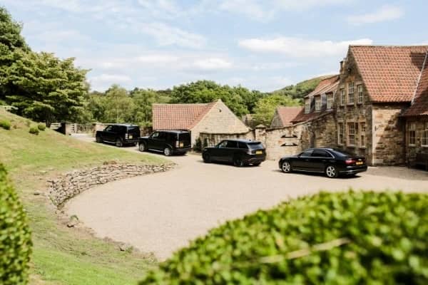CPW Chauffeur Services car in convoy on a farm